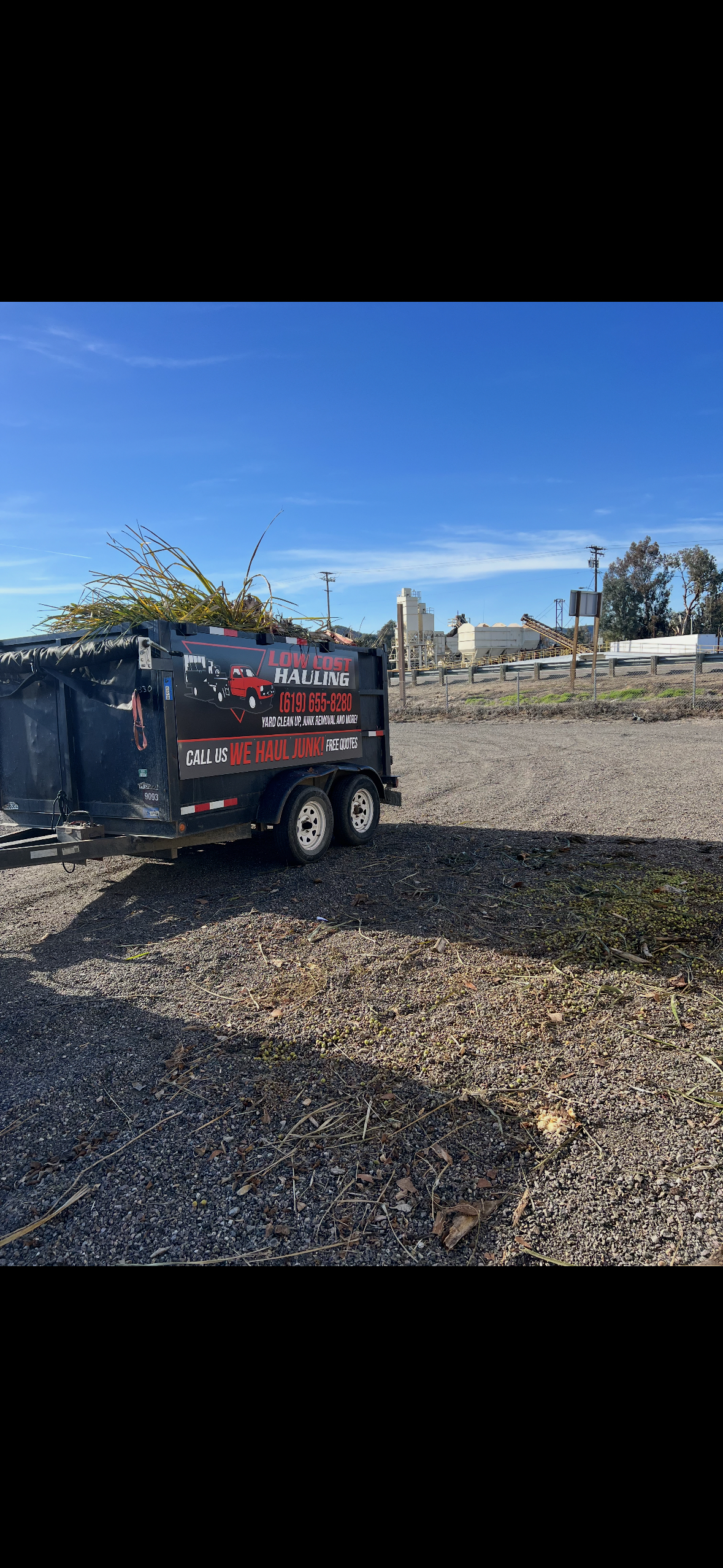 Trailer loaded with yard waste for hauling